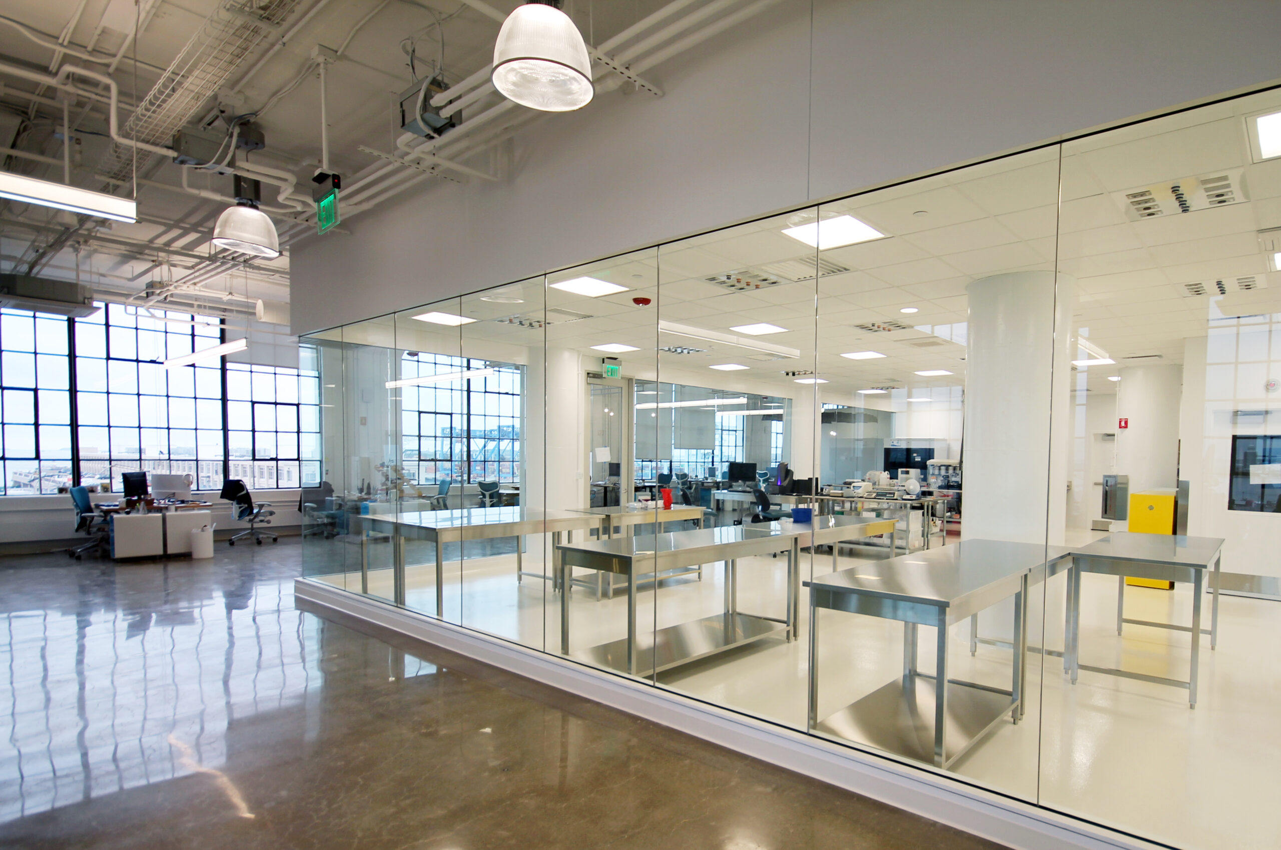 Glass encapsulated labs, surrounded by collaborative work space.